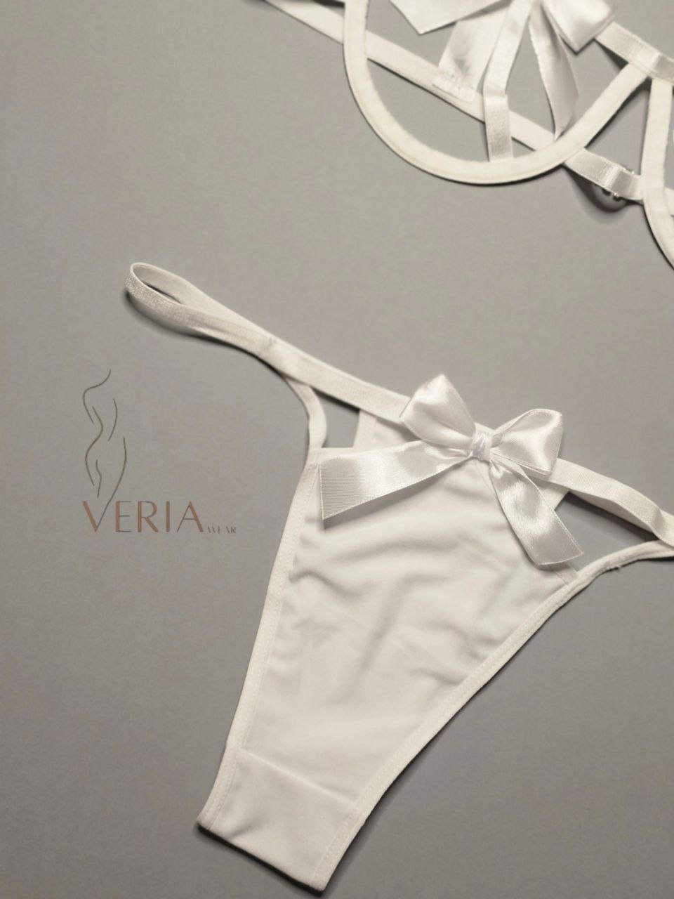 White women’s lingerie set with bow design - elegant bra and panty set