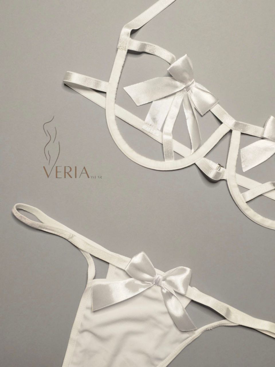 White women’s lingerie set with bow design - elegant bra and panty set